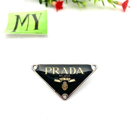 Prada Metal Logo .